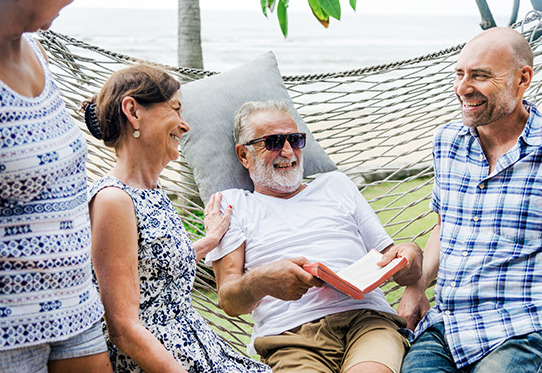 Family Laughing on Hammock Is Retirement Income Taxable California