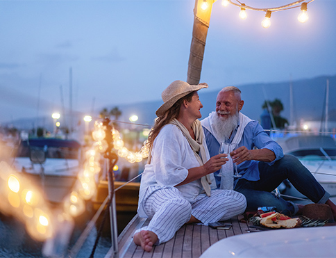 couple sitting on dock at dusk guaranteed lifetime income for retirement folsom ca
