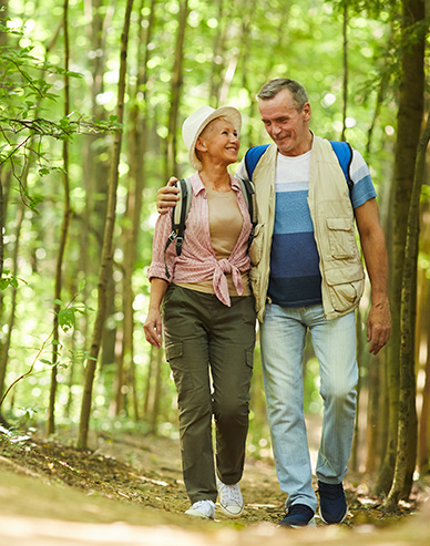 senior couple walking in woods together are fixed index annuities a good investment folsom ca