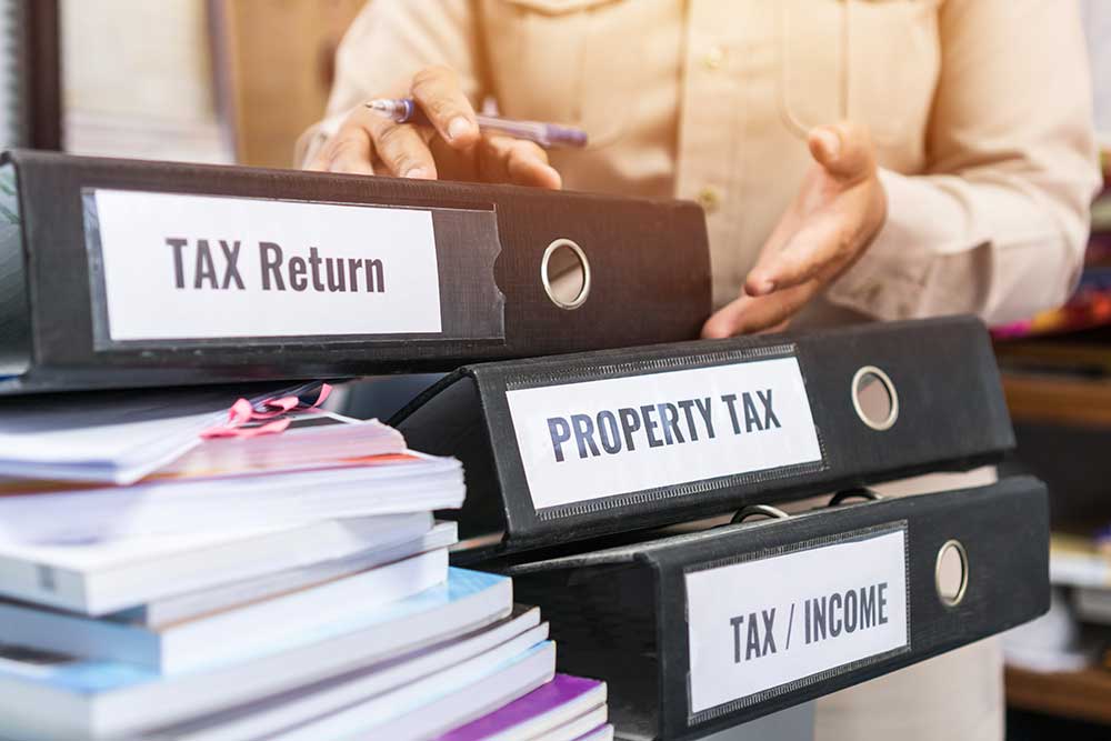 2020 tax law changes and how they affect retirement black binders with labels